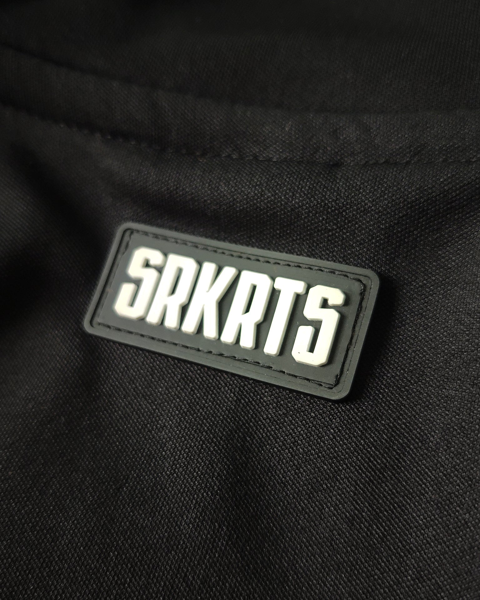 Track Club Jacke | SRKRTS | Schwarz
